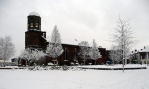 A view of St Peter's Church taken from St Peter's Square in the snow